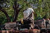 Ayutthaya, Thailand. Wat Phra Ram, headless Buddha statue of the west viharn. 